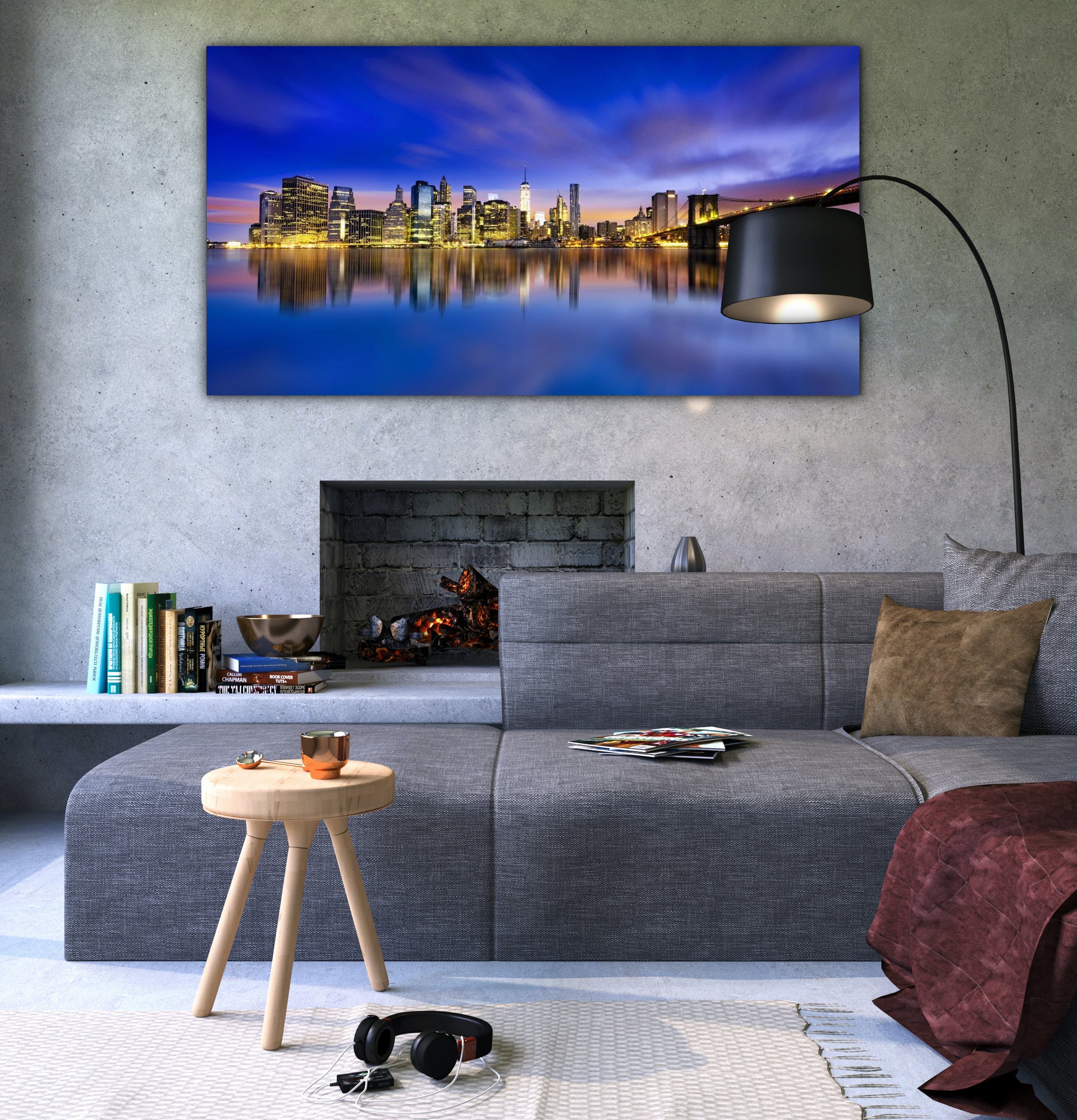 A glossy acrylic art print featuring a cityscape at dusk, displayed above a grey sofa in a room with a modern decor.