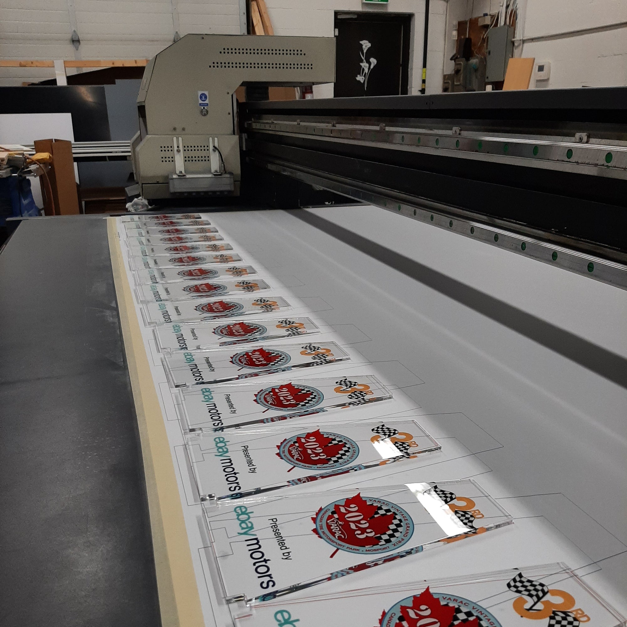 Custom clear acrylic signs with high-resolution UV printing on a flatbed press, manufactured by Home Sign Depot in Toronto.